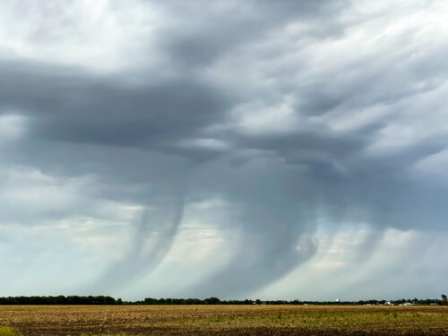 Storm Clouds Dancing Across the Prairie